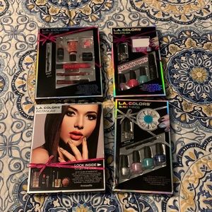 4 BNIB L.A. Colors kits-2 nail kits, 1 lip kit, and 1 makeup kit.